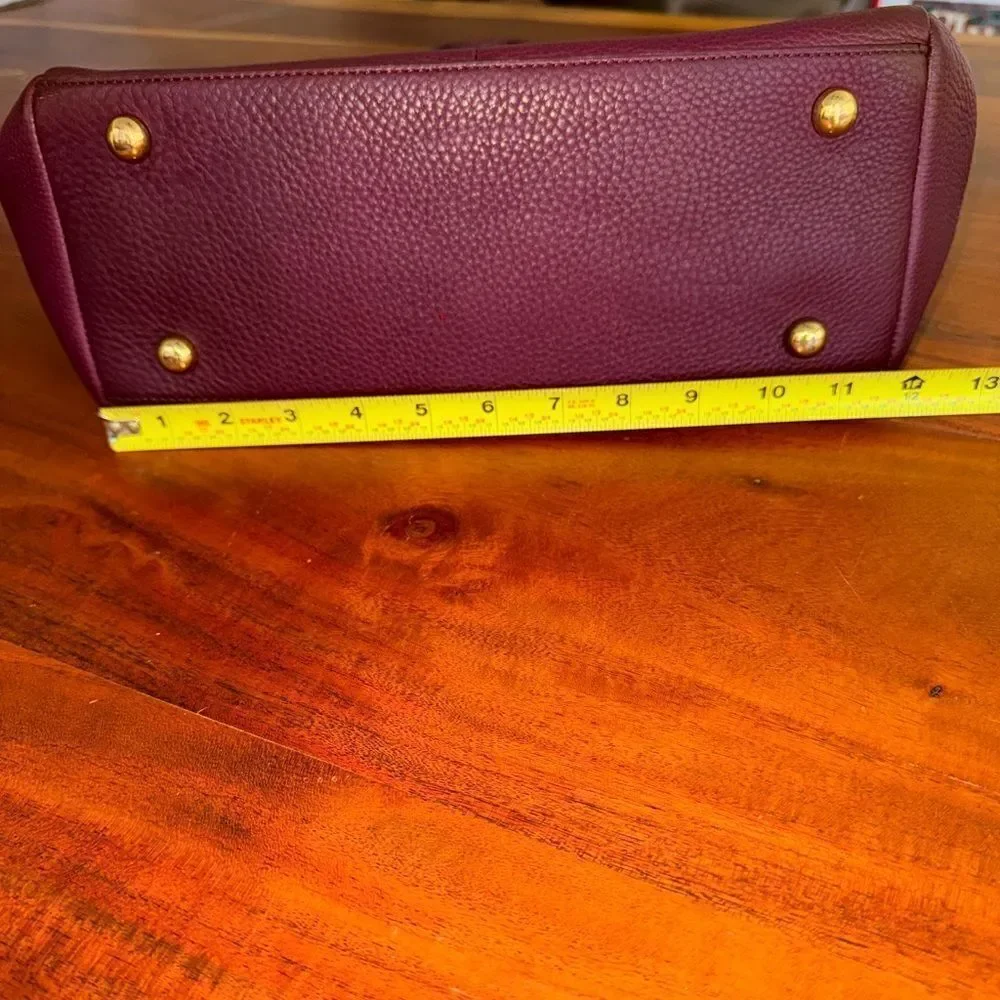 Issac Mizrahi leather handbag with large faux croc pocket.   Magnetic closure